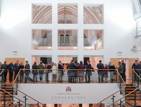 staff on the balcony of the creative campus building